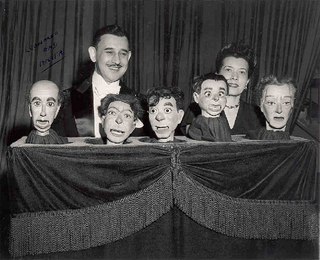 Illustration for article titled Vintage ventriloquism portraits were incredibly unnerving